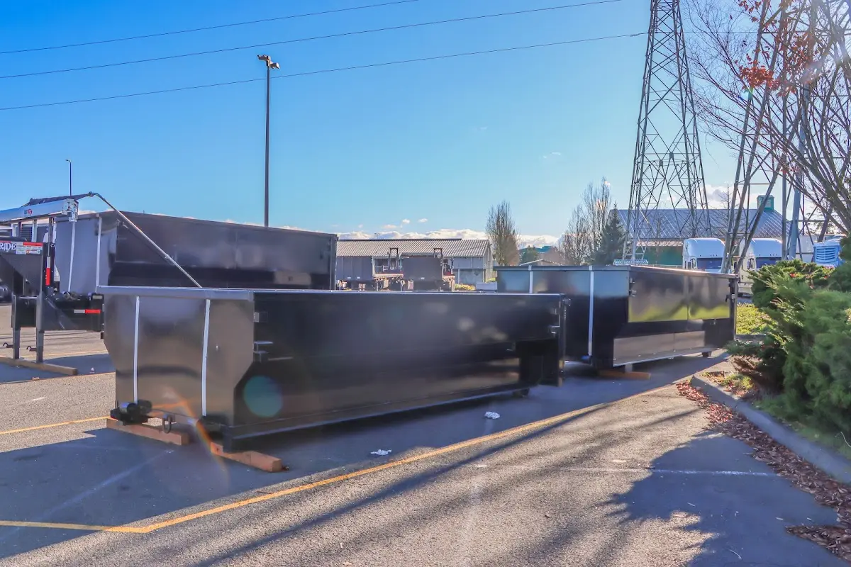 Roll-off dumpster ready for waste disposal at job site for 2 Yard Dumpster Rental in Medina